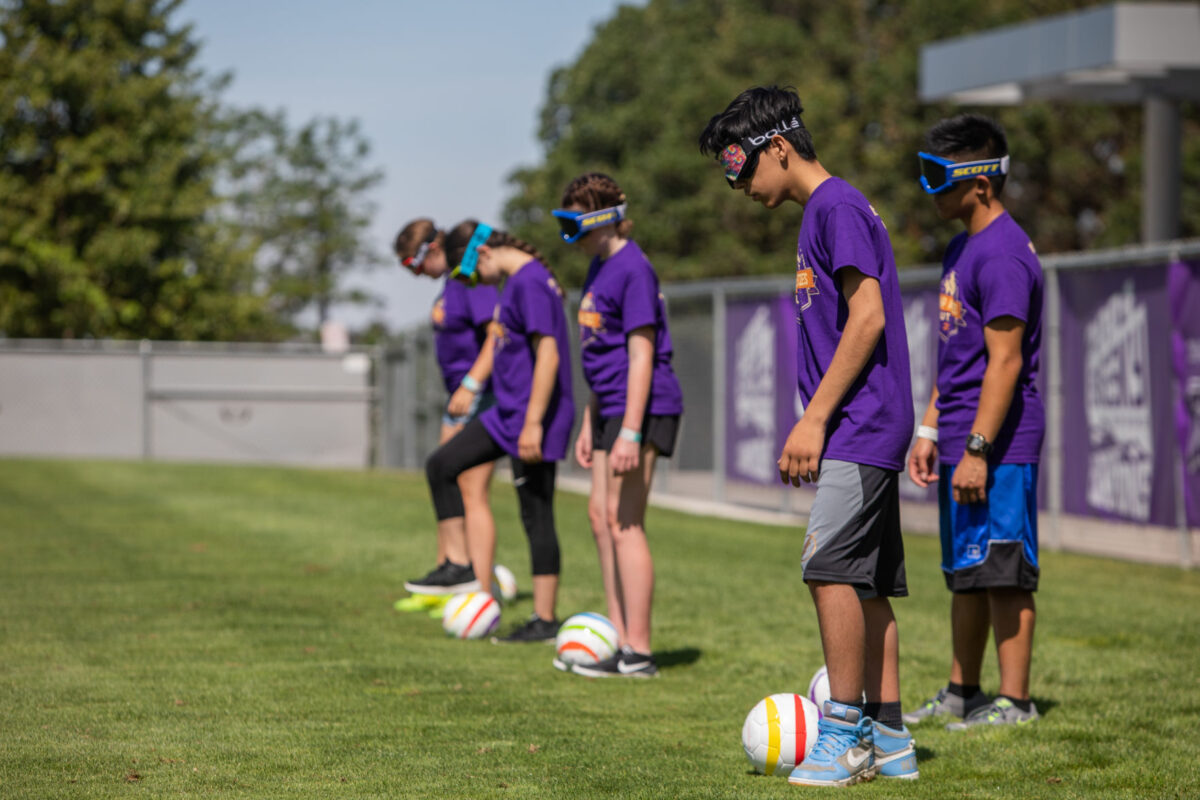 Young people with vision impairments expand abilities at sports camp at er State News